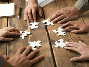 Description_of_image_used_in_foster_carers_roles_and_responsibilities_hands_jigsaw