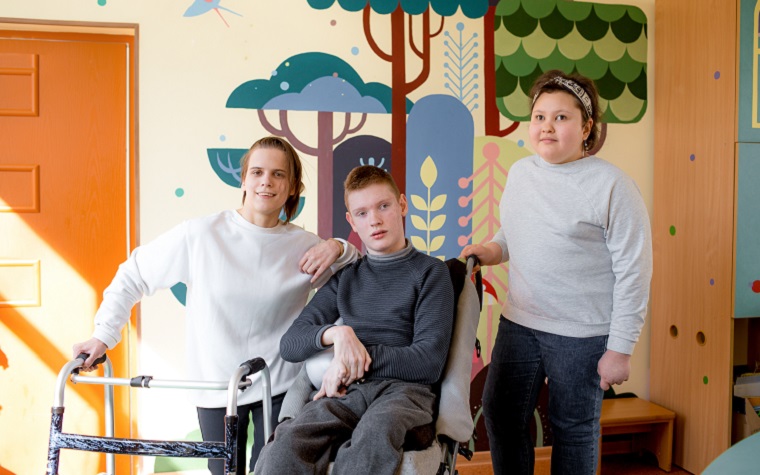 a group of teenagers with disabilities in a residential/short breaks centre