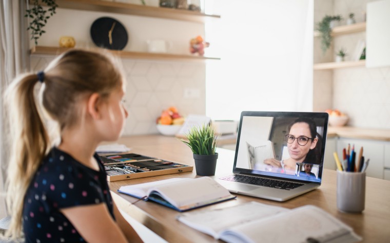 girl having video call with social worker