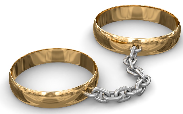 wedding rings connected by iron chain