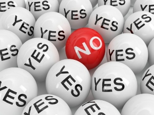White balls with the word 'yes' and one red ball with the word 'no'