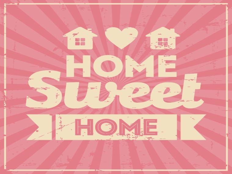 Vintage sign reading 'Home sweet home' with pink background and cream writing