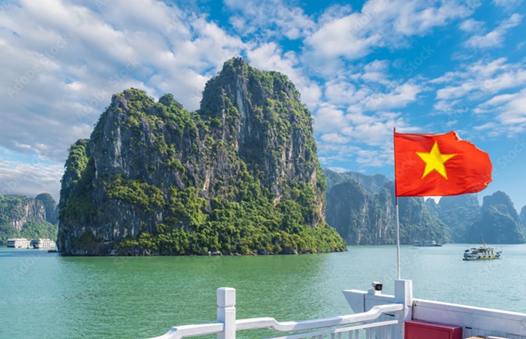 Landscape with Halong bay and Vietnamese flag, Vietnam