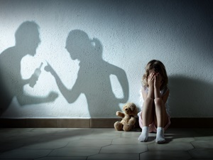 Little Girl Crying With Shadow Of Parents Arguing - Home Violence