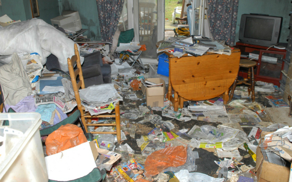Description_of_image_used_in_why_we_have_missed_opportunity_to_tackle_self-neglect_cluttered_room_West_Yorkshire_Fire_and_Rescue_Service