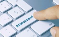 Image of computer key marked 'assessment' (Credit: momius / Adobe Stock)