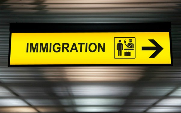 A sign saying 'immigration' at an airport