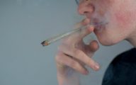 description_of_image_used_in_motivational_interviewing_podcast_man_smoking_cannabis_joint_fotolia_remo