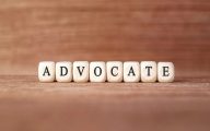 The word 'advocate' spelt out in blocks