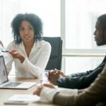 Team manager leading meeting