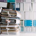 Image of stack of files (credit StockPhotoPro / Adobe Stock)