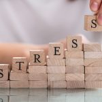 Image of wooden blocks spelling out 'stress' (credit: Andrey Popov / Adobe Stock)