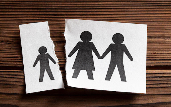 Outline image of family with child at a distance from parents (credit: adragan / Adobe Stock)