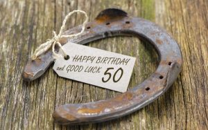 Horseshoe with message 'happy birthday and good luck 50'