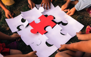 Children piece together a jigsaw
