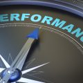 Dial pointing at the word 'performance'