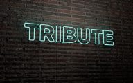 The word 'tribute' in neon lights