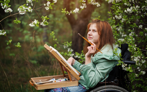 Disabled woman painting