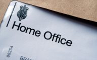 UK Home Office paper letters received in brown envelope. Authentic documents. Concept for Visas and immigration.