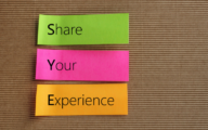 Post-it writing 'Share Your Experience'