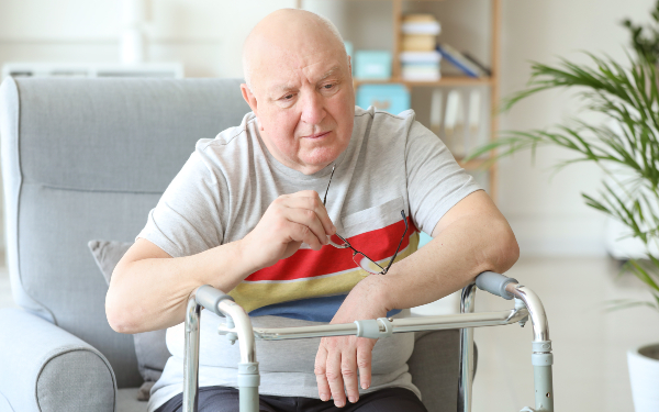 Portrait of sad older man in nursing home