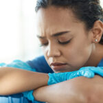 Care worker or nurse looking stressed