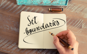 notebook with the written note "setting boundaries"