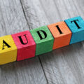 Blocks spelling out the word 'audit'