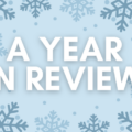 The title 'a year in review' with snowflakes all around.