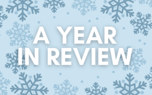 The title 'a year in review' with snowflakes all around.