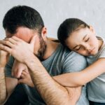 Child consoling parent/carer