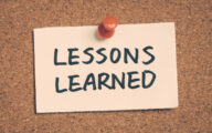 The message 'lessons learned' pinned to a corkboard