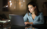 A social worker working late at home