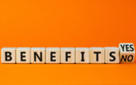 Cubes spelling out the word 'benefits' with a final cube having 'Yes' on one face and 'No' on the other
