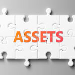 The word 'assets' spelt out in a jigsaw
