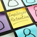 Grid of nine post-it notes with 'employee retention' written on the central one