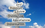 Help, support, advice, guidance, assistance, information - wooden signpost with six arrows