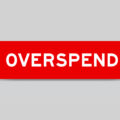 Red sign with the word 'overspend'