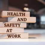 Wooden blocks spelling out 'health and safety at work'