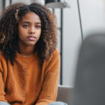 Young woman receiving counselling