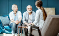 An older couple having a consultation with a doctor