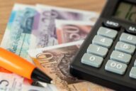 British Pounds, calculator and money file, financial settlements, household budget, taxes, British currency exchange rate, financial analysis, UK economic and business concept
