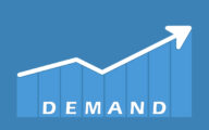 A line graph going upwards with an arrow on the end above the word 'demand' against a blue background